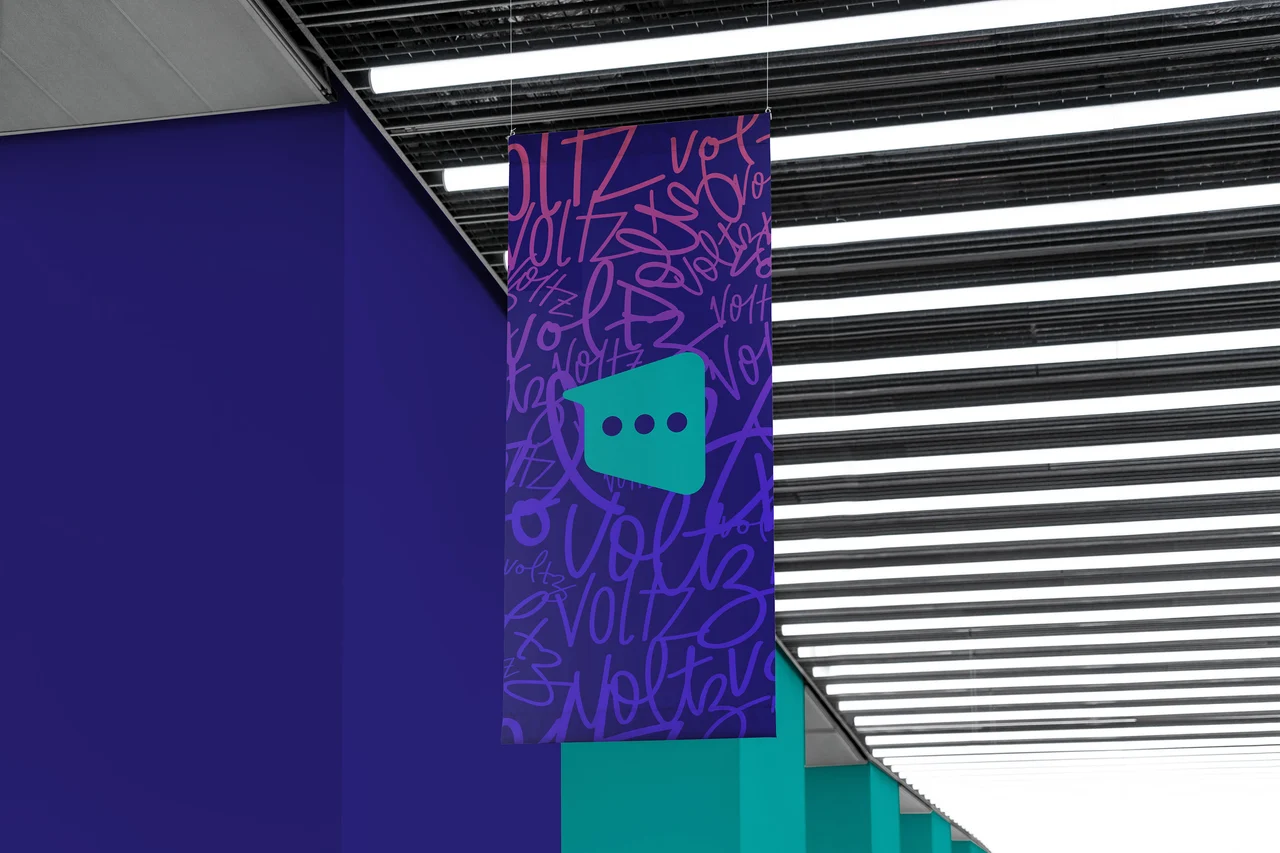 voltz — a hanging banner with handwritten lettering and the conversation symbol